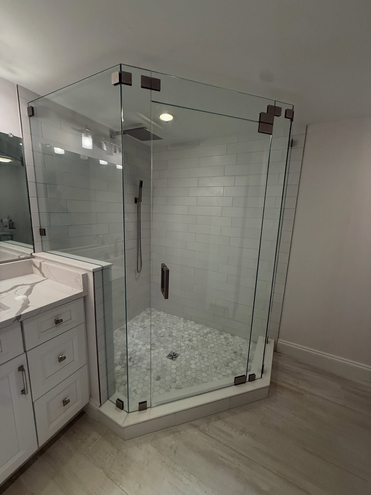 Clear neo-angle shower enclosure with chrome hardware